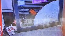 Fleeing robber gets stuck under store’s roller shutters