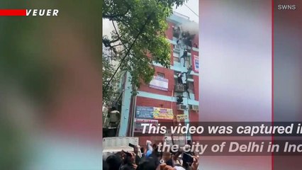 After a Fire Broke Out at a School Dozens of Students Climb Out Window, Descend to Safety via a Single Rope