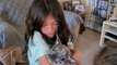 Cute children are delighted and overwhelmed when surprised with a puppy
