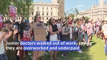 ‘Overworked, underpaid’: Junior doctors in London stage strike over salaries
