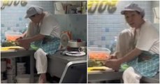 Chef se corta las uñas en cocina de restaurante vegano