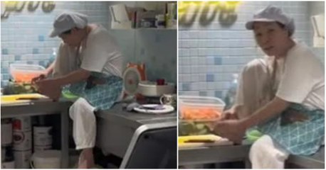 Chef se corta las uñas en cocina de restaurante vegano