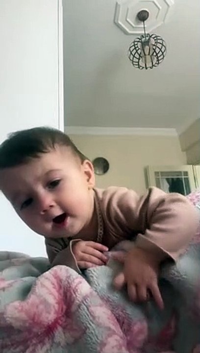 Cute baby talk to dada