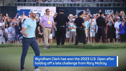 BREAKING NEWS - Clark holds off McIlroy to win U.S. Open
