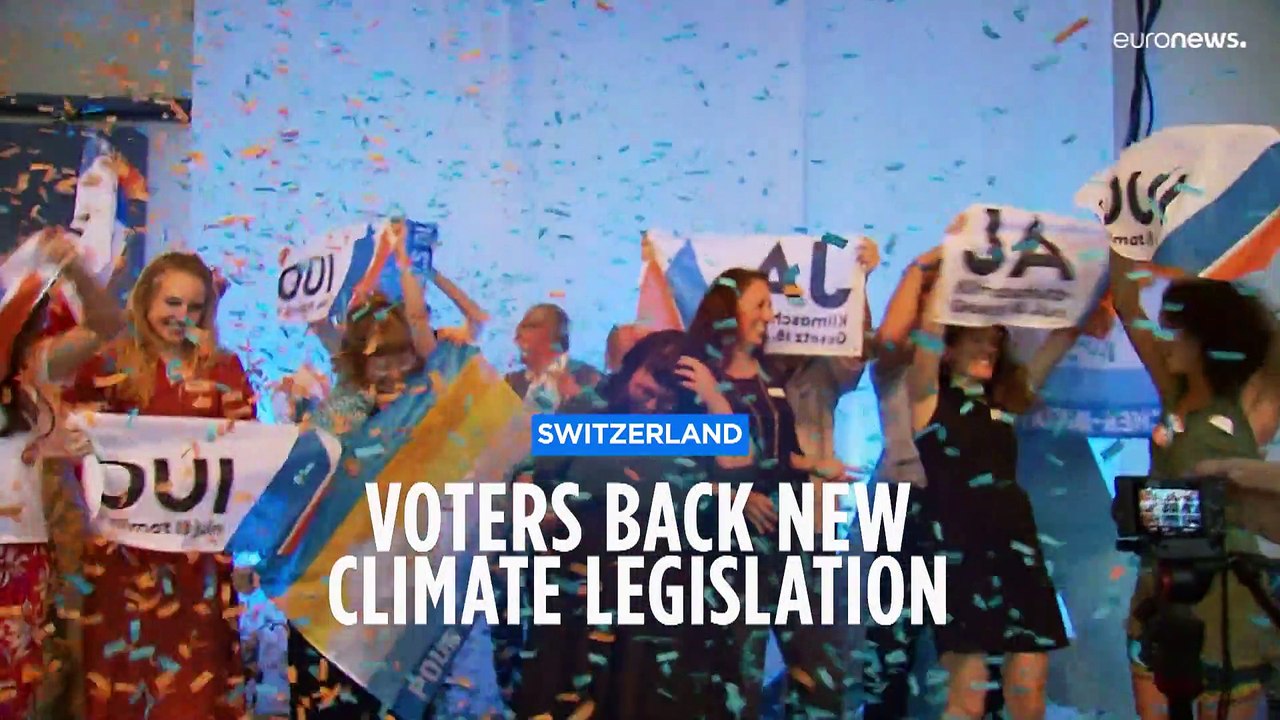Climate activists rejoice as Swiss voters back new law with net zero target for 2050