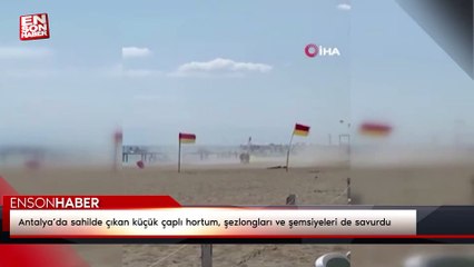 Antalya’da sahilde çıkan küçük çaplı hortum, şezlongları ve şemsiyeleri de savurdu