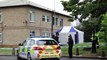 Woman and teenage boy arrested on suspicion of murder after a man's body was found at a flat