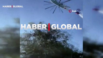 Kıl payı kurtuldular! Helikopterin soğutma çalışmasını çeken muhabirler tonlarca suyun altında kalıyordu