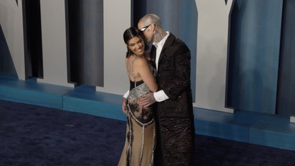 Kourtney Kardashian Debuted Her Baby Bump in a Sheer Bodysuit and Extreme Low Rise Leather