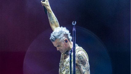 Robbie Williams is still struggling with Covid-19 as he has problems performing on stage