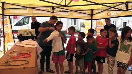 Konteyner kentteki çocuklar, yavru köpeklerin kalp atışlarını dinledi