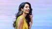 Amal Clooney Ditched Her Trademark Soft Waves For Disco-Inspired Curls And We're Obsessed