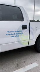 Car Drives Down Interstate With Hood Popped Open