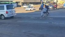Man scares the pedestrians crossing road with an air horn *Hilarious Prank*
