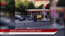 Bidonla benzin alamayınca aracını çalışanların üzerine sürdü