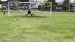 Guy ends up Hitting Goalkeeper in Face While Kicking Football Into Goalpost