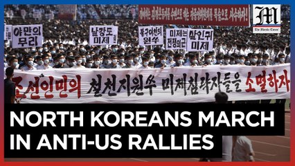 Thousands of North Koreans march in anti-US rallies as country marks Korean War anniversary