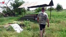 Ukrainian Farmer Uses Russian Ammunition Boxes to Rebuild His War-Destroyed Home