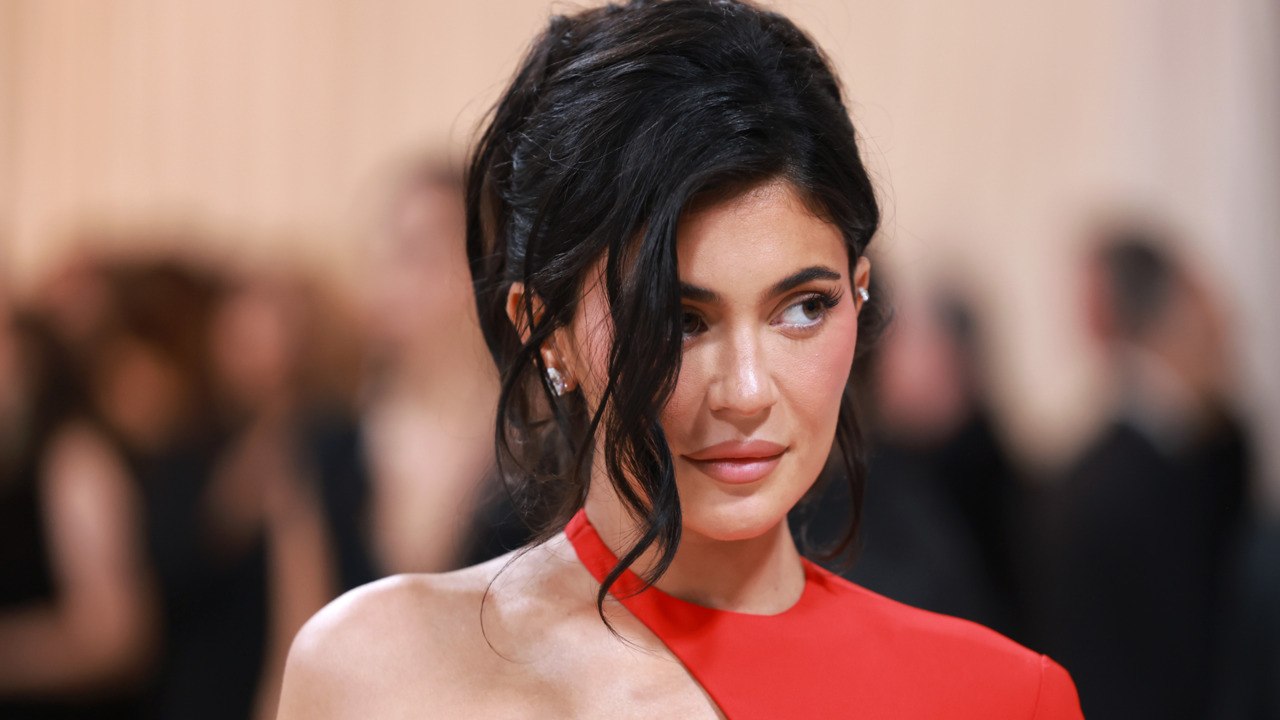 Kylie Jenner Matched Her Fiery Red String Bikini to a Glass of Red Wine