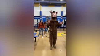 Soldier Disguised As School Mascot Reunites With Daughter