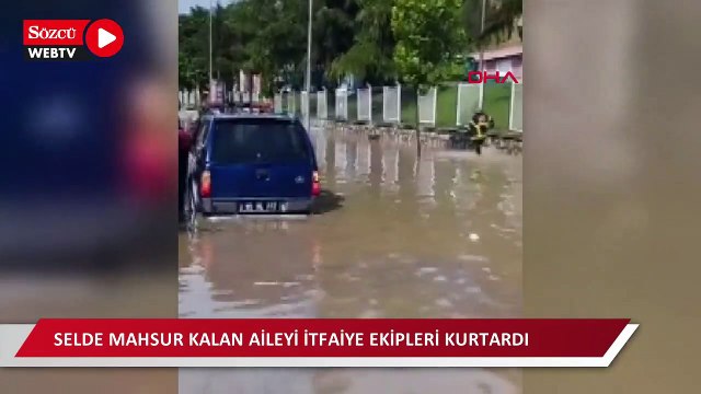 Amasya'da sel sularının ortasında mahsur kalan aileyi itfaiye ekipleri kurtardı