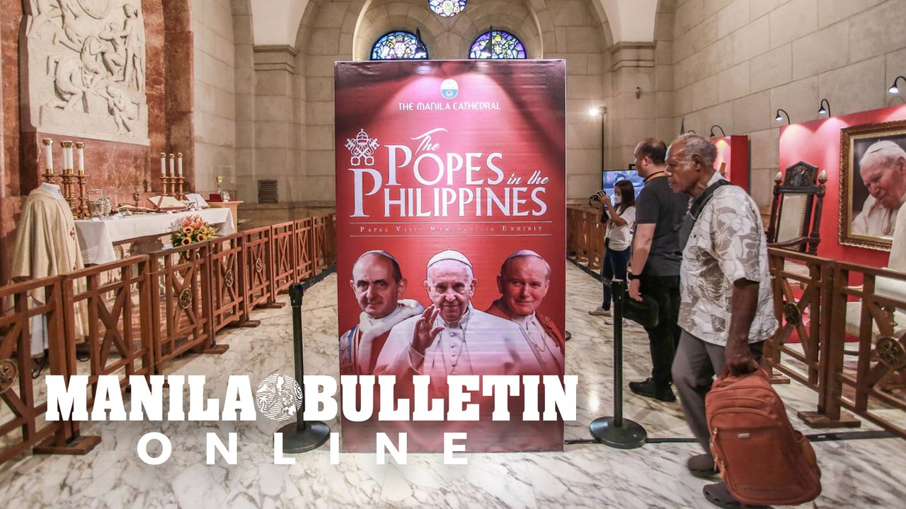 Tourists visit Papal visit Memorabilia exhibit in Manila Cathedral