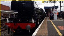 The Flying Scotsman arrives at Doncaster Station to crowds of hundreds of people