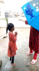 Kids enjoying in Rain at Islamabad