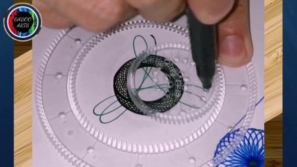 DIBUJANDO con un espirógrafo una flor negra y verde. DRAWING with a spirograph a black and green flower.