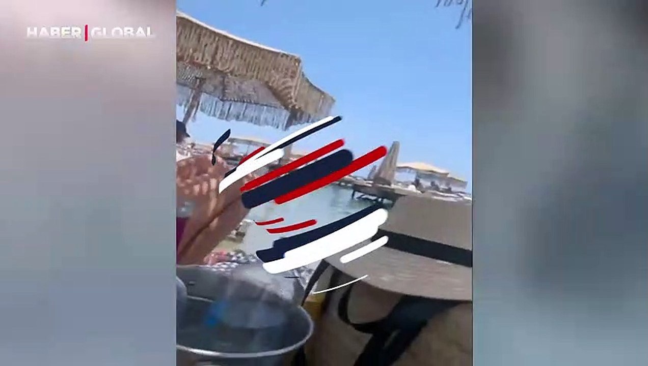 Plajda tepki çeken görüntüler: Güneşlenen müşterilere 'köle gibi hizmet'