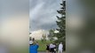 Golfers watch in amazement after game gets interrupted by approaching tornado