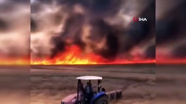 Ekili alandaki yangına müdahale etmek isteyen traktör alevler içerisinde kaldı