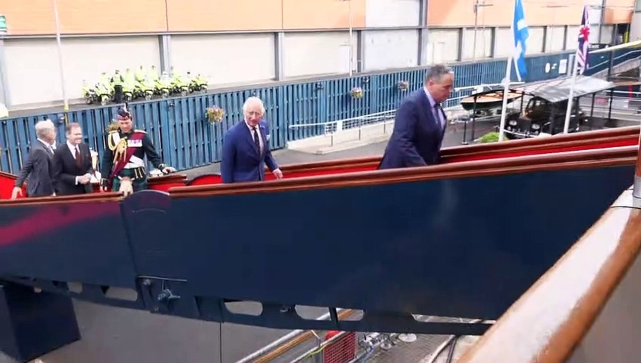 King attends a reception on the Royal Yacht Britannia