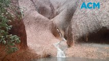 Heavy rain produces rare waterfalls in Uluru