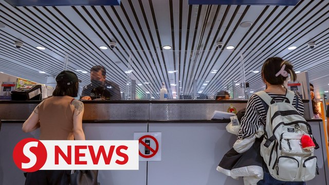 MACC hunt agent who 'assists' Chinese tourists held up by Immigration