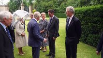 King opens Jubilee Gates in honour of late Queen