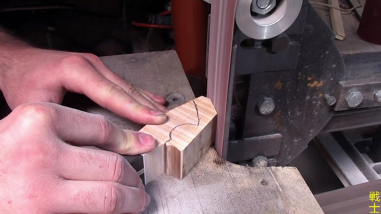 Woodworker Grinds Down Handle