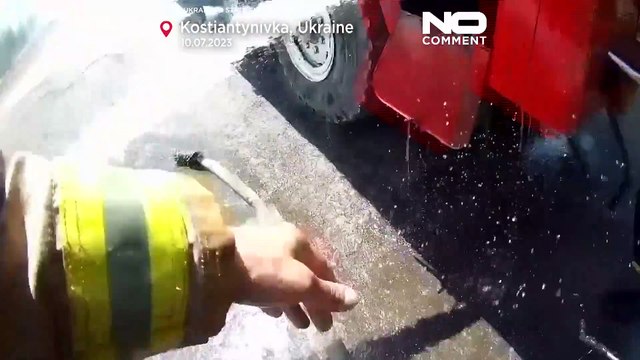 Watch: Ukrainian firefighters shelled while putting out blaze