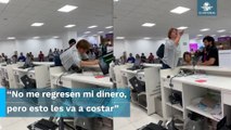 Mujer desata su furia contra aerolínea, hace volar computadoras y teclados