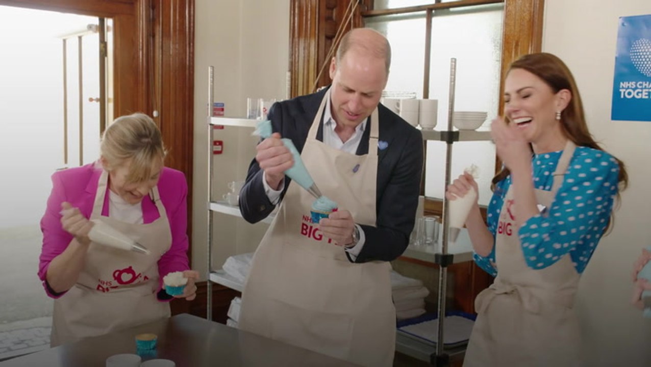 Kate and William weigh in on scone debate as they decorate cakes during surprise NHS tea party