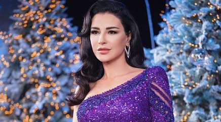 شجار عنيف بين ماغي بو غصن وسيدة تعنّف طفلها في الشارع