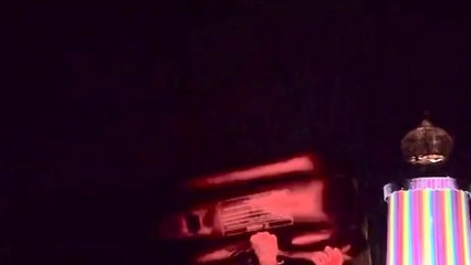 Woody Cook crowd surfs on an inflatable bed at dad Fatboy Slim's Glastonbury set