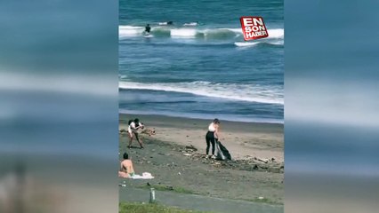 Çöp toplayıp fotoğraf çektirdi: İşi bitince sahili kirleterek geri döndü