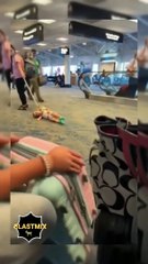 LADY DRAGS CHILD THROUGH AIRPORT
