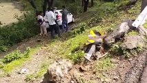an attempt to save the bike rider, the car overturned