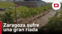 La riada desatada por las fuertes tormentas en Zaragoza deja atrapadas a decenas de personas en sus vehículos
