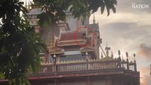 Foreigner climbs atop pagoda of Phra Mahathat Chedi | The Nation