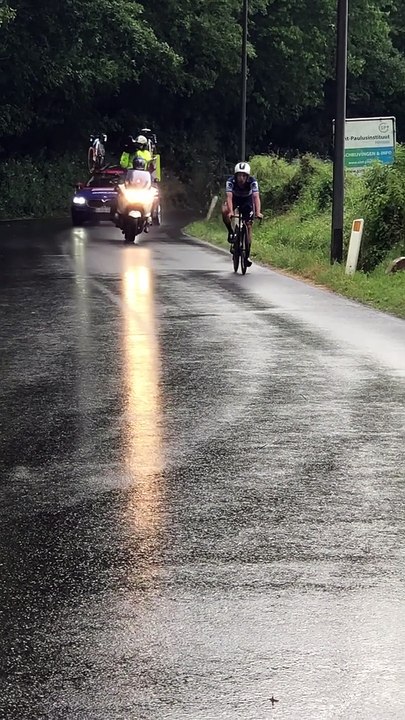 Cyclist Slides On Slippery Street