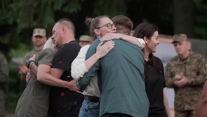 Former POWs welcomed back to Ukraine in ceremony headed by Zelensky