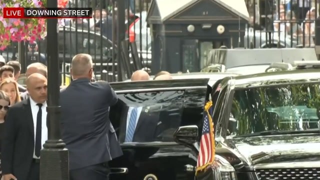US President Joe Biden arrives in Downing Street to be greeted by UK PM Rishi Sunak